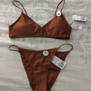 rust colored swimsuit